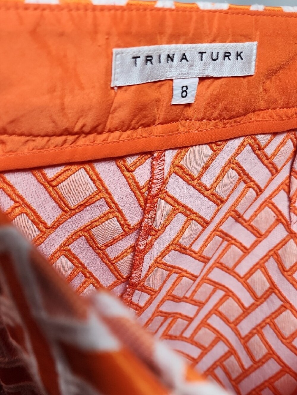 TRINA TURK | Orange and White Geometric Print Women's Shorts - Picture 2 of 8